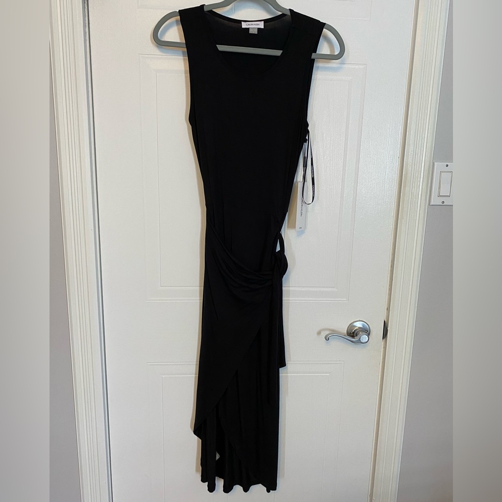 Beautiful black Calvin Klein midi dress. Wrap around